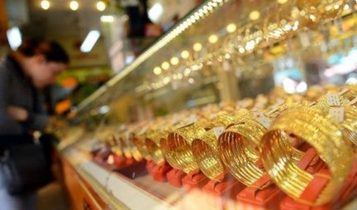 Giá vàng leo thang bất chấp đồng USD tăng vọt