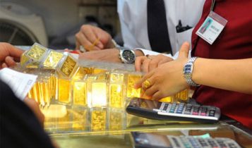 Đồng USD bật tăng, vàng quay đầu giảm